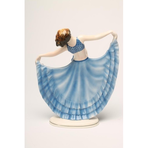 101 - AN ART DECO KATZHUTTE EARTHENWARE OF A YOUNG DANCER wearing a blue spotted bikini top, her arms outs... 