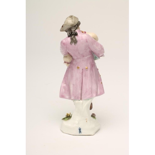 41 - A SAMSON PORCELAIN FIGURE, late 19th century, of a young male bagpipe player wearing a grey hat and ... 