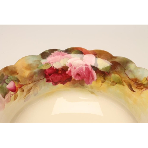 51 - A ROYAL WORCESTER CHINA ROSE BOWL, 1912, of squat baluster form with everted scalloped rim and two n... 