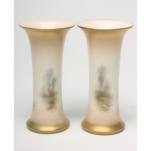 59 - A PAIR OF ROYAL WORCESTER CHINA VASES, 1921, of waisted cylindrical form painted in polychrome ename... 