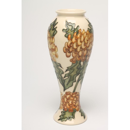 90 - A MOORCROFT POTTERY VASE, 1993, of slender inverted baluster form, tubelined by Gillian Powell and p... 