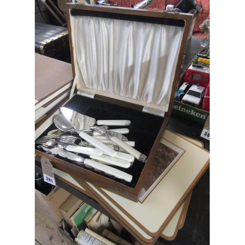 381 - SET OF PLACE MATS AND BOX OF CUTLERY