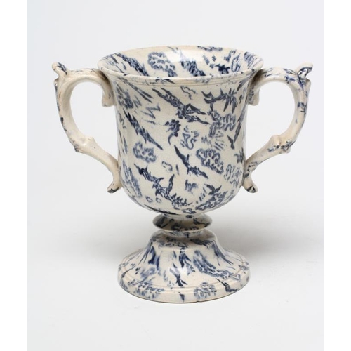 16 - A PEARLWARE LOVING CUP, c.1830, the bell shaped bowl inscribed in black 