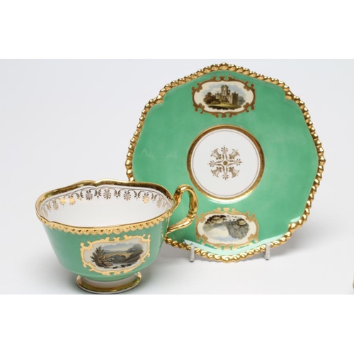 30 - A FLIGHT, BARR & BARR PORCELAIN TEA CUP AND SAUCER painted with named vignette panels comprising 