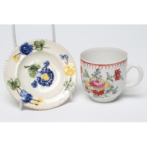 38 - A BOW PORCELAIN COFFEE CUP, c.1760, painted in polychrome enamels with flowers, unmarked, 2 1/4