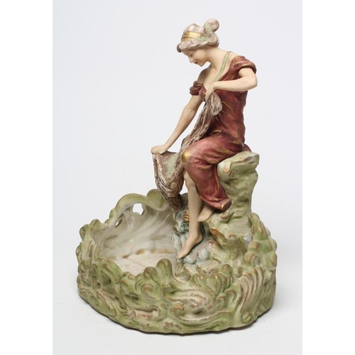 56 - A LARGE ROYAL DUX STYLE BISQUE PORCELAIN FIGURAL CENTRE BOWL, early 20th century, modelled as a youn... 