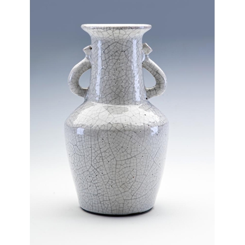 67 - EDMUND DE WAAL (b.1964), an early stoneware Chinese style vase with two plain loop handles in a pale... 