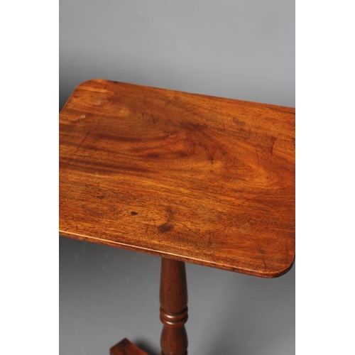 747 - A GEORGIAN MAHOGANY TRIPOD TABLE, early 19th century, the rounded oblong snap top raised on ring and... 