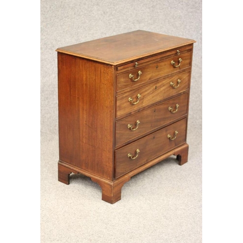 752 - A SMALL GEORGIAN MAHOGANY CHEST, late 18th century, the moulded edged top over brushing slide and fo... 