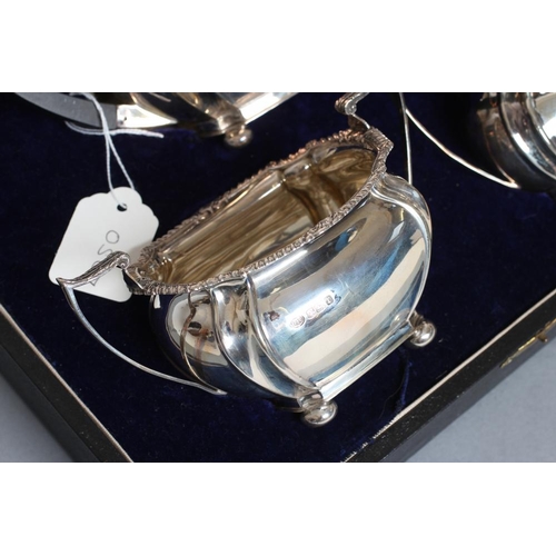 110 - A BACHELOR'S COMPOSITE EDWARDIAN THREE PIECE TEA SERVICE, maker's mark J.R., Sheffield 1904 (teapot)... 