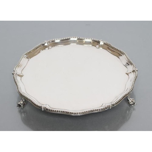 116 - A LATE GEORGE III SMALL SALVER, maker probably John Harris, London 1809, of shaped circular form, th... 