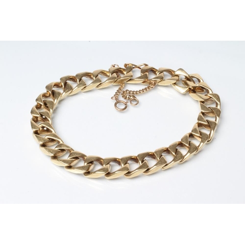 137 - A FLAT CURB LINK CHAIN BRACELET, stamped 585, with fine safety chain stamped 9k, 8 1/2