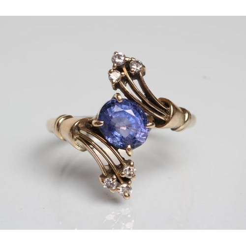 187 - A SAPPHIRE AND DIAMOND COCKTAIL RING, the oval facet cut sapphire diagonally claw set to triple edge... 