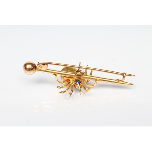 195 - AN EDWARDIAN SPIDER BROOCH with oval facet cut sapphire head and blister pearl body on arrow head ba... 