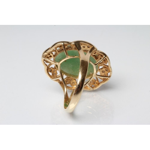 198 - A COCKTAIL RING, the oval cabochon polished jadeite panel claw set to an open floriform border set w... 