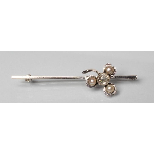 203 - A DIAMOND AND PEARL BAR BROOCH, the old facet cut oval diamond open back collet set to a clover leaf... 