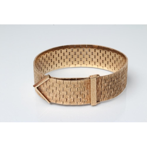 208 - A 9CT GOLD STRAP BRACELET, sponsor's mark RCK, London 1968, with brushed bark finish and faux buckle... 