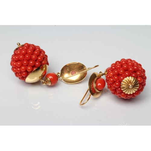 217 - A PAIR OF CORAL EAR BOBS, the beaded spheres with yellow metal mounts on shepherd's crook hooks, unm... 