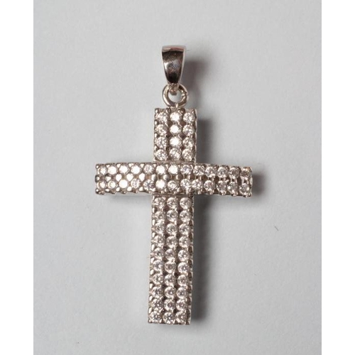 225 - A DIAMOND CROSS PENDANT, the sixty eight small round brilliants point set to a slightly convex frame... 