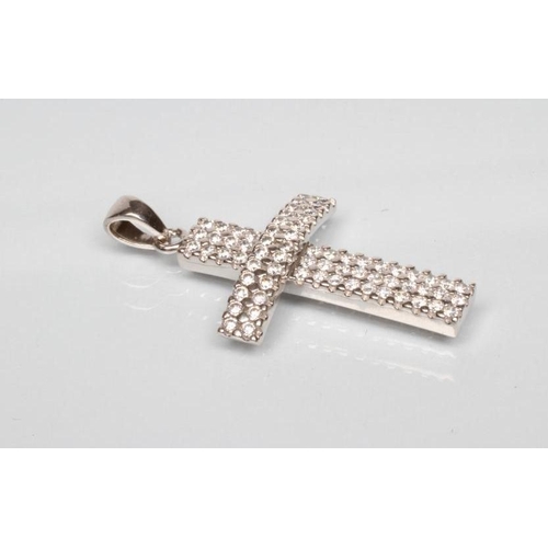 225 - A DIAMOND CROSS PENDANT, the sixty eight small round brilliants point set to a slightly convex frame... 