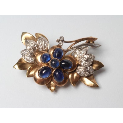 227 - A SAPPHIRE AND DIAMOND FLOWER BROOCH, the six cabochon polished sapphires collet set to plain leaves... 