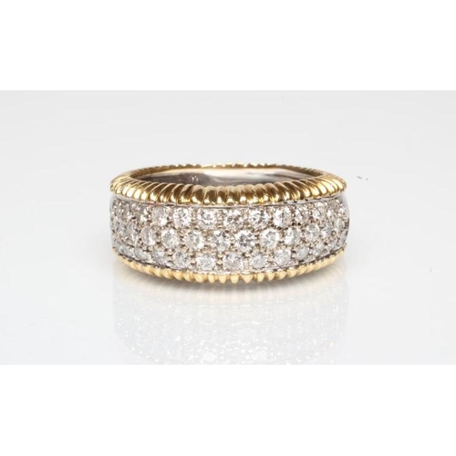 229 - A DIAMOND HALF HOOP ETERNITY RING, the triple row of small stones point set in platinum to a wide ba... 