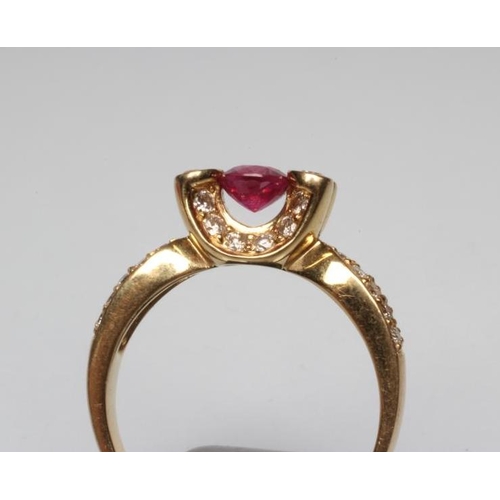 239 - A RUBY AND DIAMOND COCKTAIL RING, the circular facet cut ruby prong set between two pairs of diamond... 