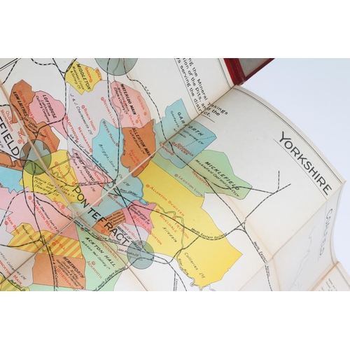 310 - AROUND HALIFAX, reduced Ordnance Survey folding cloth map by G.G. Richmond, together with another, Y... 