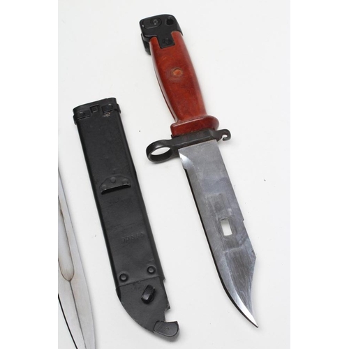 329 - TWO AK47 BAYONETS, the first date stamped 1958 with spear point blade and two piece bakelite grip, 1... 