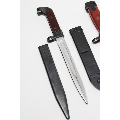 329 - TWO AK47 BAYONETS, the first date stamped 1958 with spear point blade and two piece bakelite grip, 1... 