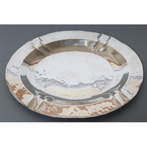 85 - AN ITALIAN PLATTER, maker Renato Raddi, of lobed oval form with lightly planished finish, 15