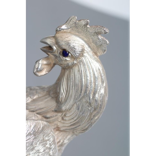89 - A PAIR OF MODELS OF FIGHTING COCKS, maker Camusso, STERLING, 925, with blue glass eyes, stamped and ... 