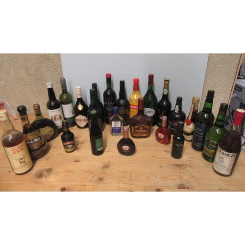 54 - A large quantity of liqueurs, including 2 bottles Croft Original, 1 litre Croft Particular Sherry, 1... 