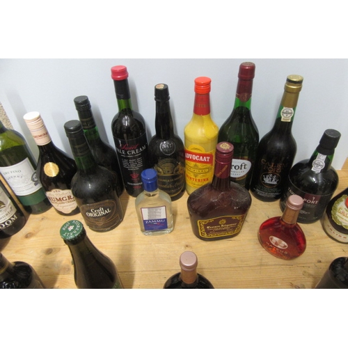 54 - A large quantity of liqueurs, including 2 bottles Croft Original, 1 litre Croft Particular Sherry, 1... 