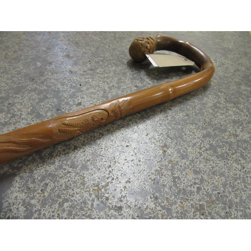 35 - BAMBOO WALKING CANE WITH CARVED DRAGON DECORATION