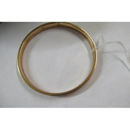 174 - 9CT GOLD HOLLOW BANGLE   9.5 GMS