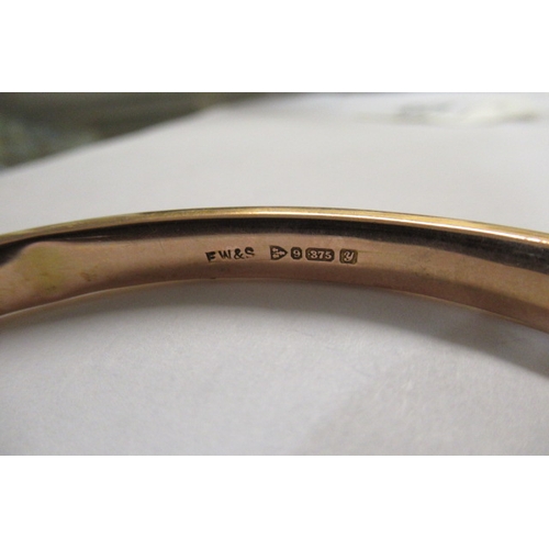 174 - 9CT GOLD HOLLOW BANGLE   9.5 GMS