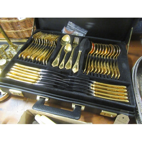 266 - BRIEFCASE OF GOLD PLATED SOLINGER CUTLERY