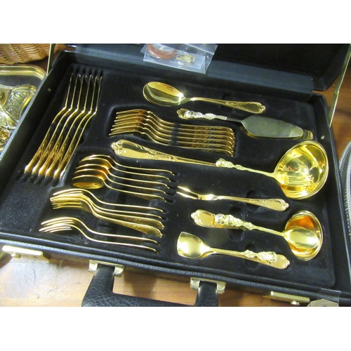 266 - BRIEFCASE OF GOLD PLATED SOLINGER CUTLERY
