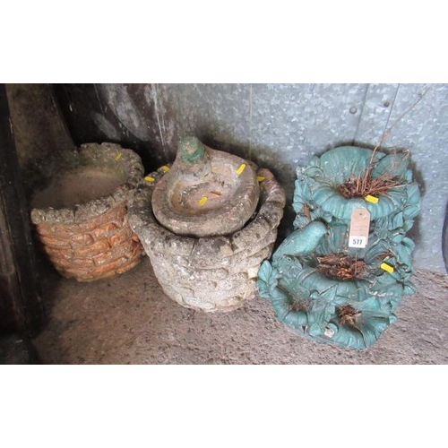 577 - TWO COMPOSITE PLANTERS AND TWO OTHERS