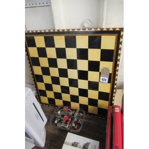 523 - LARGE CHESS BOARD WITH METAL CHESS PIECES