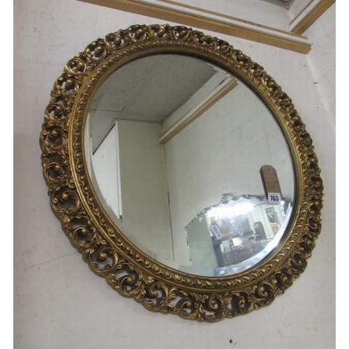 763 - GILT AND CARVED WOOD CIRCULAR MIRROR