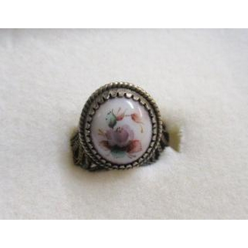 206 - WHITE METAL RING WITH FLORAL CERAMIC INSERT