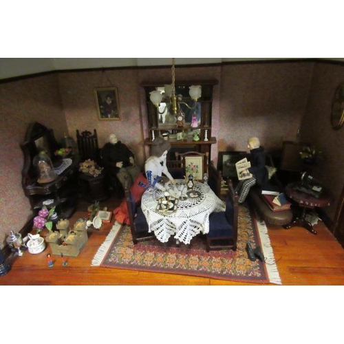 116 - A large Georgian style doll's house and contents, of wooden construction with nine internal rooms, w... 