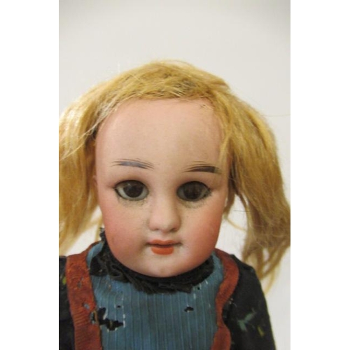 12 - Two French bisque socket head dolls, one 9 1/2