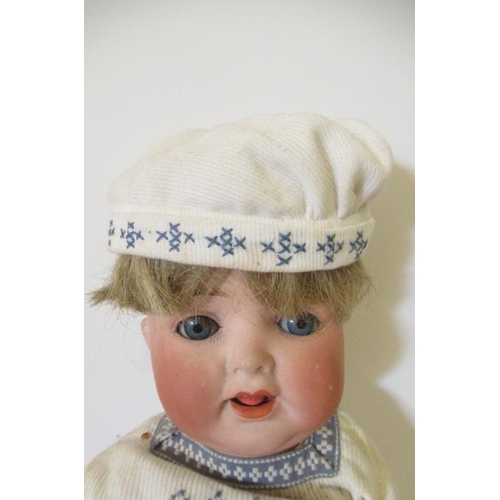 127 - A Heubach Koppelsdorf bisque socket head character doll, with blue glass sleeping eyes, open mouth, ... 