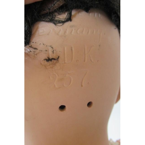 138 - A J D Kestner bisque socket head character doll, with brown glass sleeping eyes, open mouth, applied... 