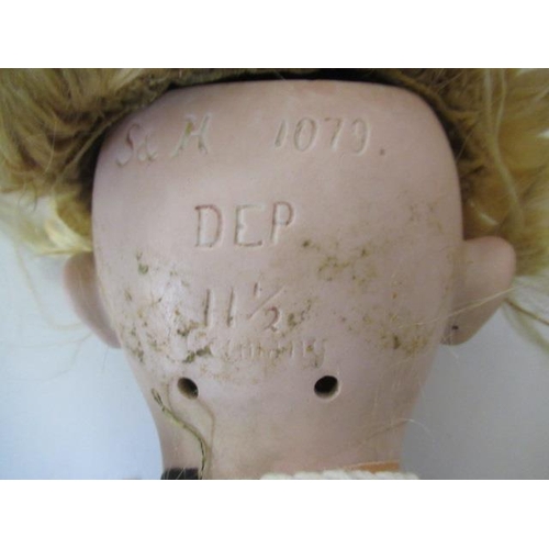 17 - Three bisque socket head dolls, comprising a 14