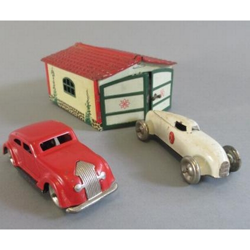 183 - Lehmann Gnom toys tinplate printed garage with Gnom toys Nr807 car and Gnom toys Nr810 race car, som... 