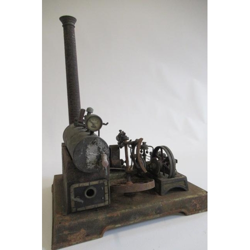 185 - A stationary steam engine with dynamo single cylinder spirit fired engine driving dynamo to light, p... 